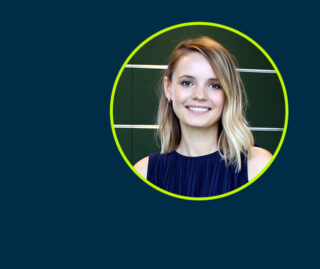 Headshot of Anna Mukhina against a dark blue background